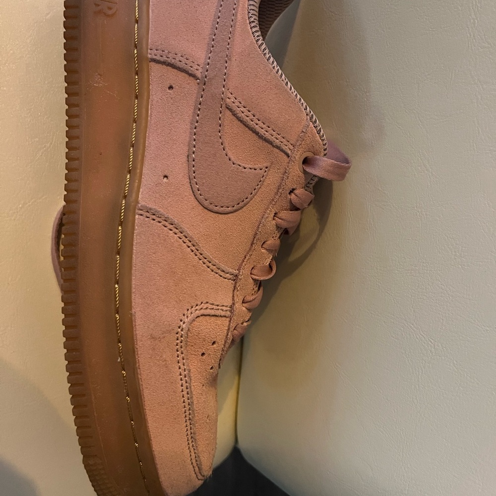 Nike Pink and Brown Athletic Shoes with Subtle Swoosh